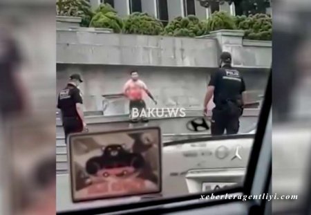 SON DƏQİQƏ: Gənc oğlan Milli Məclisin binasının qarşısında özünü doğradı - ANBAAN VİDEO