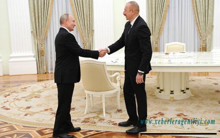 Putin birinci İlham Əliyevlə görüşdü - Video