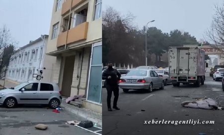 Bakıda qadın qızıllarını, qab-qacaqlarını binadan aşağı atdı - VİDEO